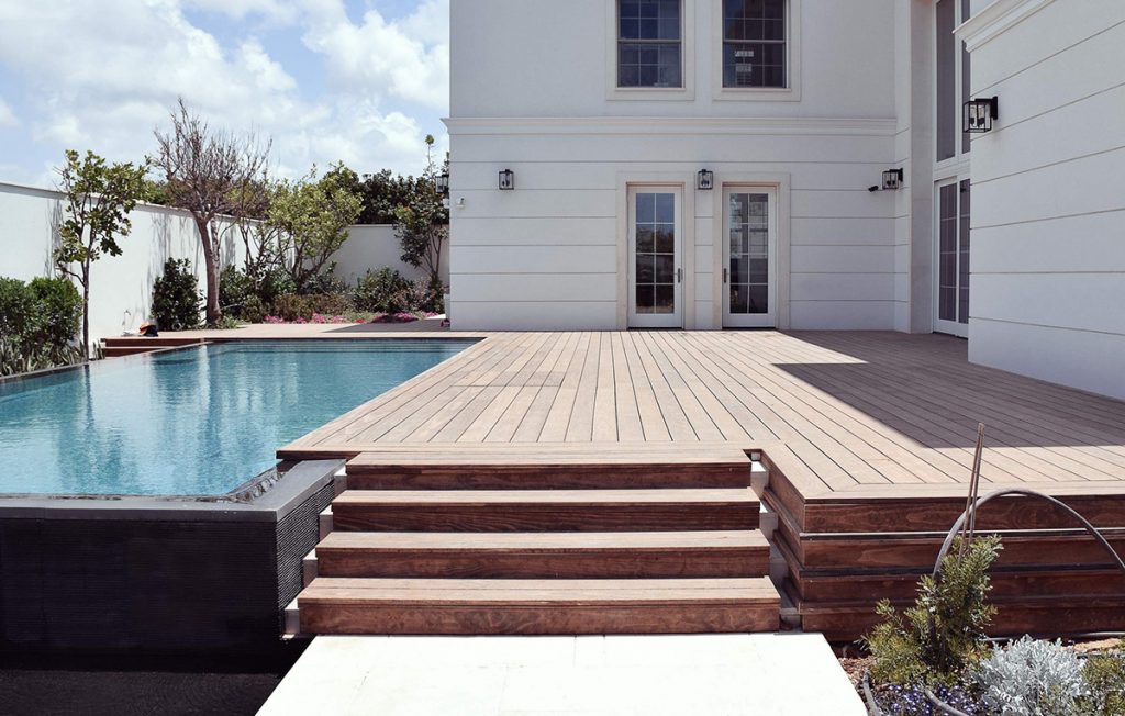 Choosing the Right Materials for Your Pool Deck: Options for Style, Durability, and Safety